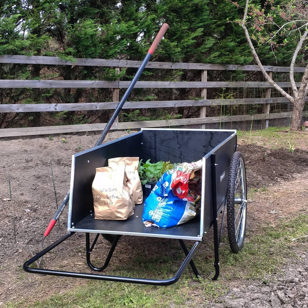 Oh happy day! My old garden cart rotted to pieces and couldn't be repaired. My new garden cart is so snazzy. Now I have to do all the chores I said I couldn't do because my garden cart was broken.